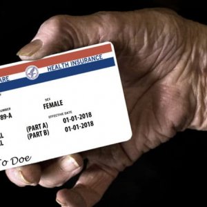 medicare-card-senior-citizen-hand-810x455
